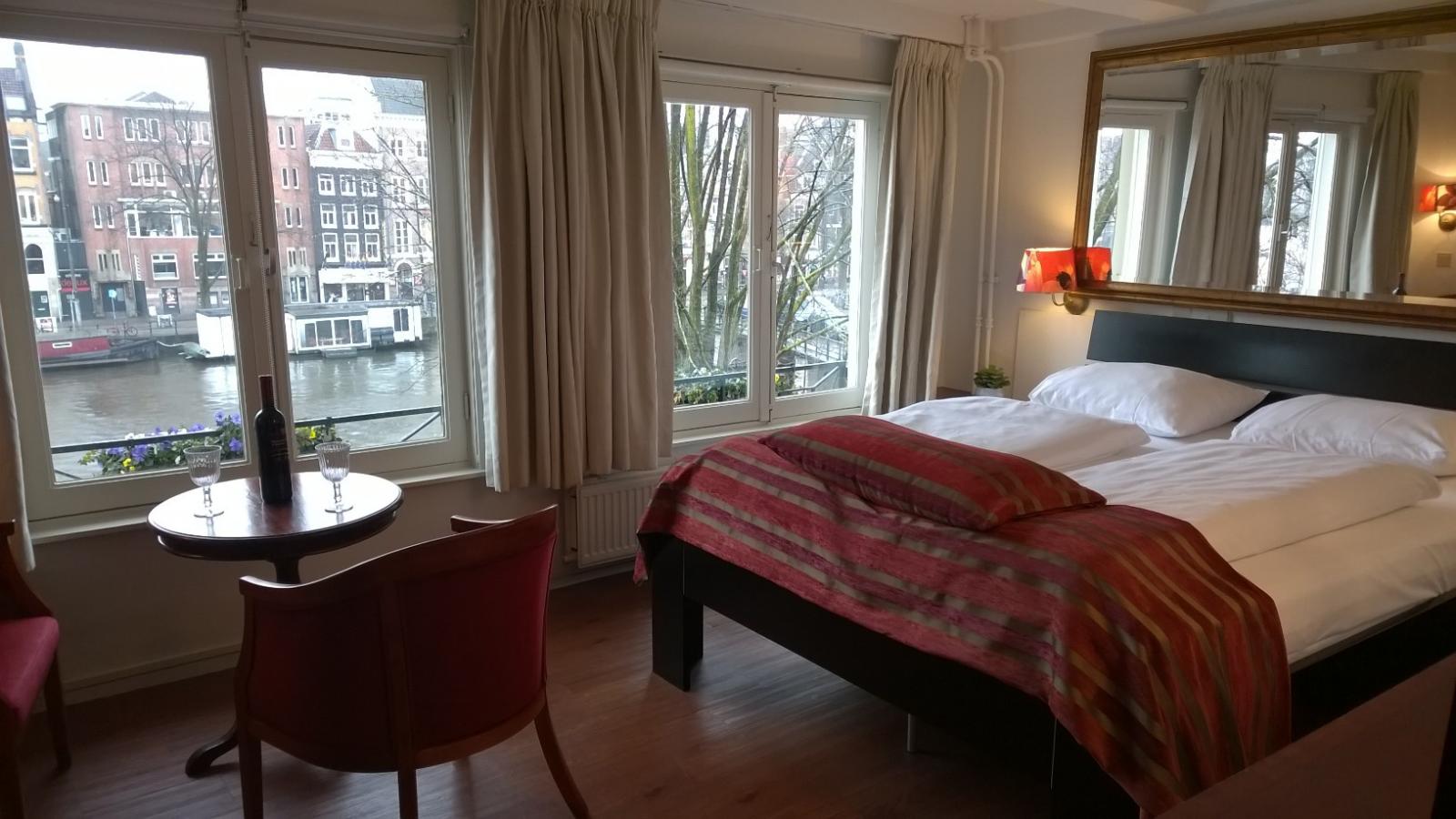 Kamer met uitzicht - Amsterdam House Hotel